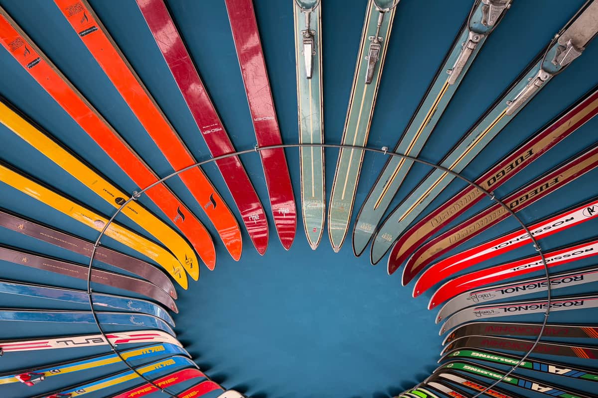 Vintage skis arranged in a circular display