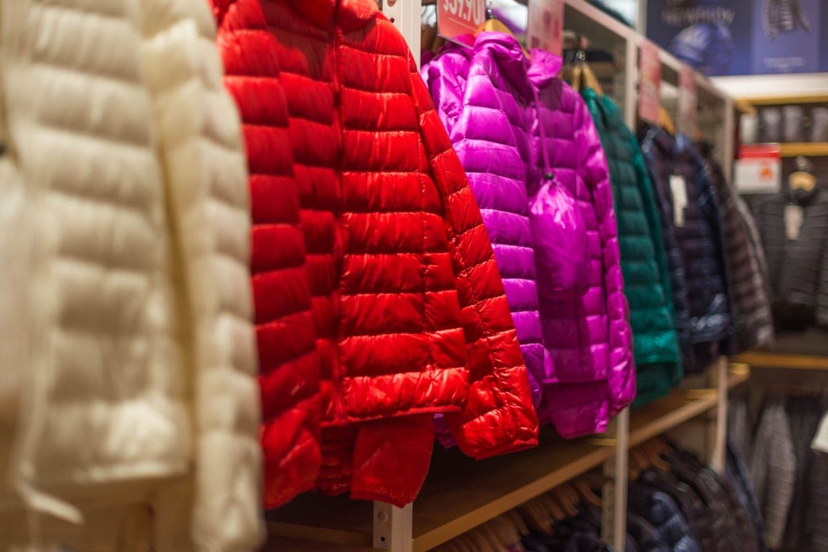 Winter jackets on display in a clothing store